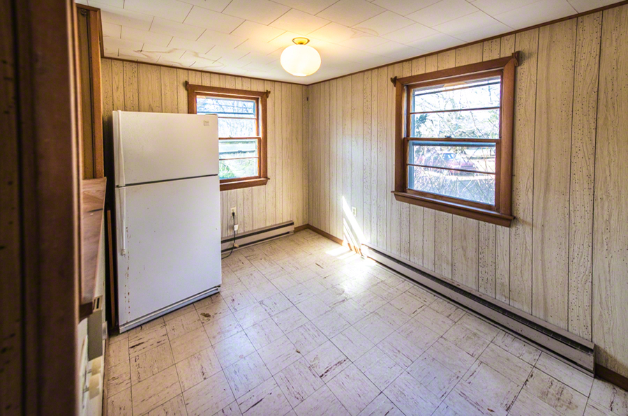 50 County Road Oak Bluffs, MA 02557 - Photo 9 of 14 a view of an empty room with a window