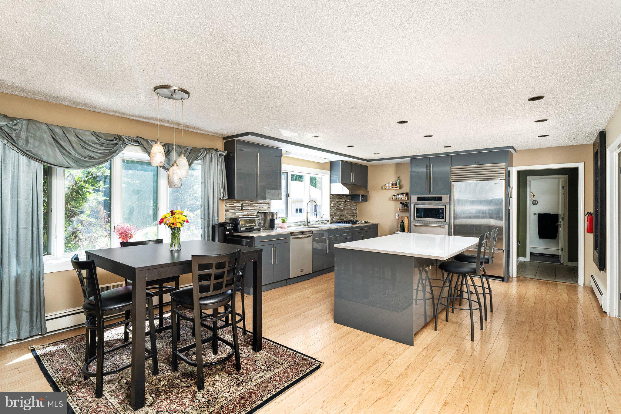 87 Bordentown Chesterfield Road Chesterfield, NJ 08515 - Photo 10 of 49 a kitchen with a table and chairs in it