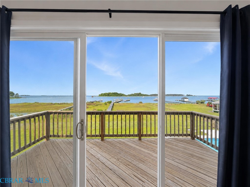 1214 Dandy Loop Road Yorktown, VA 23692 - Photo 47 of 65 a view of a balcony with wooden floor