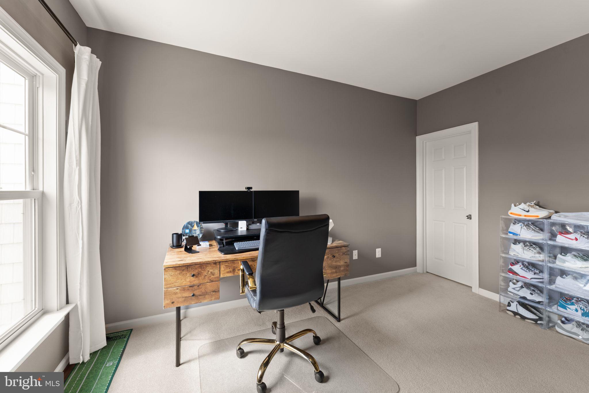 18168 Mill House Square Leesburg, VA 20176 - Photo 32 of 60 a workspace with furniture and window