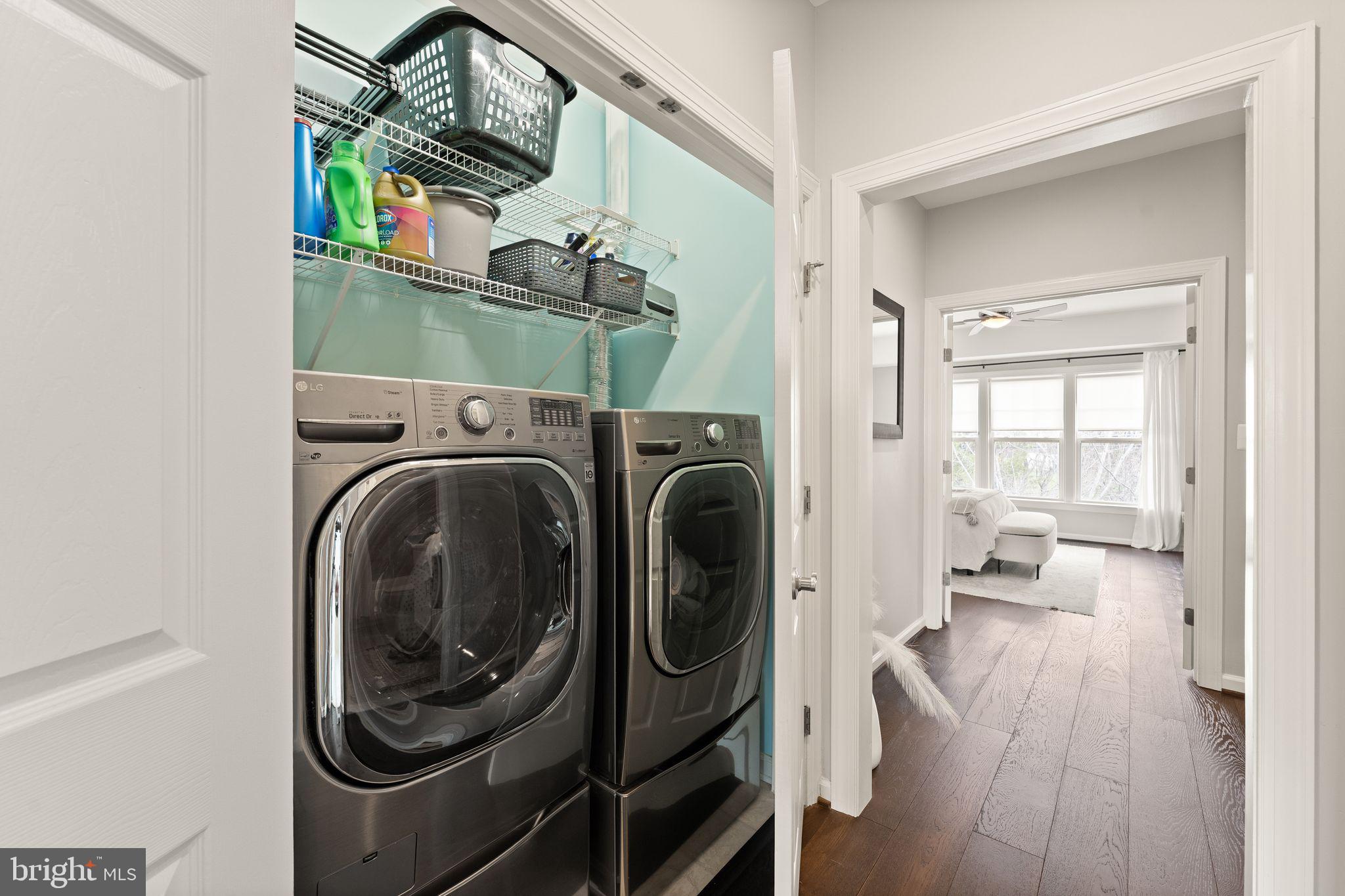 18168 Mill House Square Leesburg, VA 20176 - Photo 34 of 60 a view of a hallway with washer and dryer