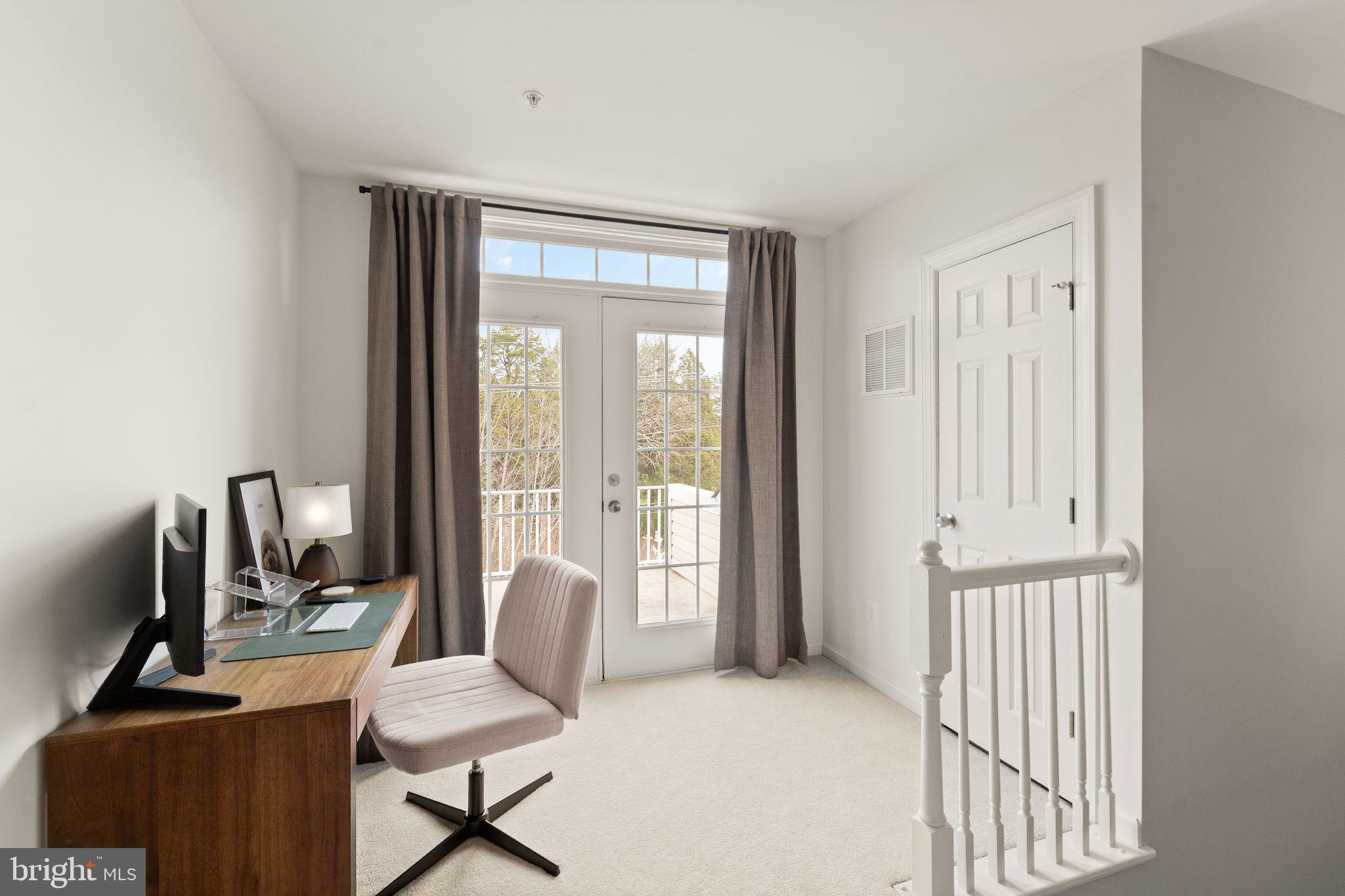 18168 Mill House Square Leesburg, VA 20176 - Photo 36 of 60 a living room with furniture and a window