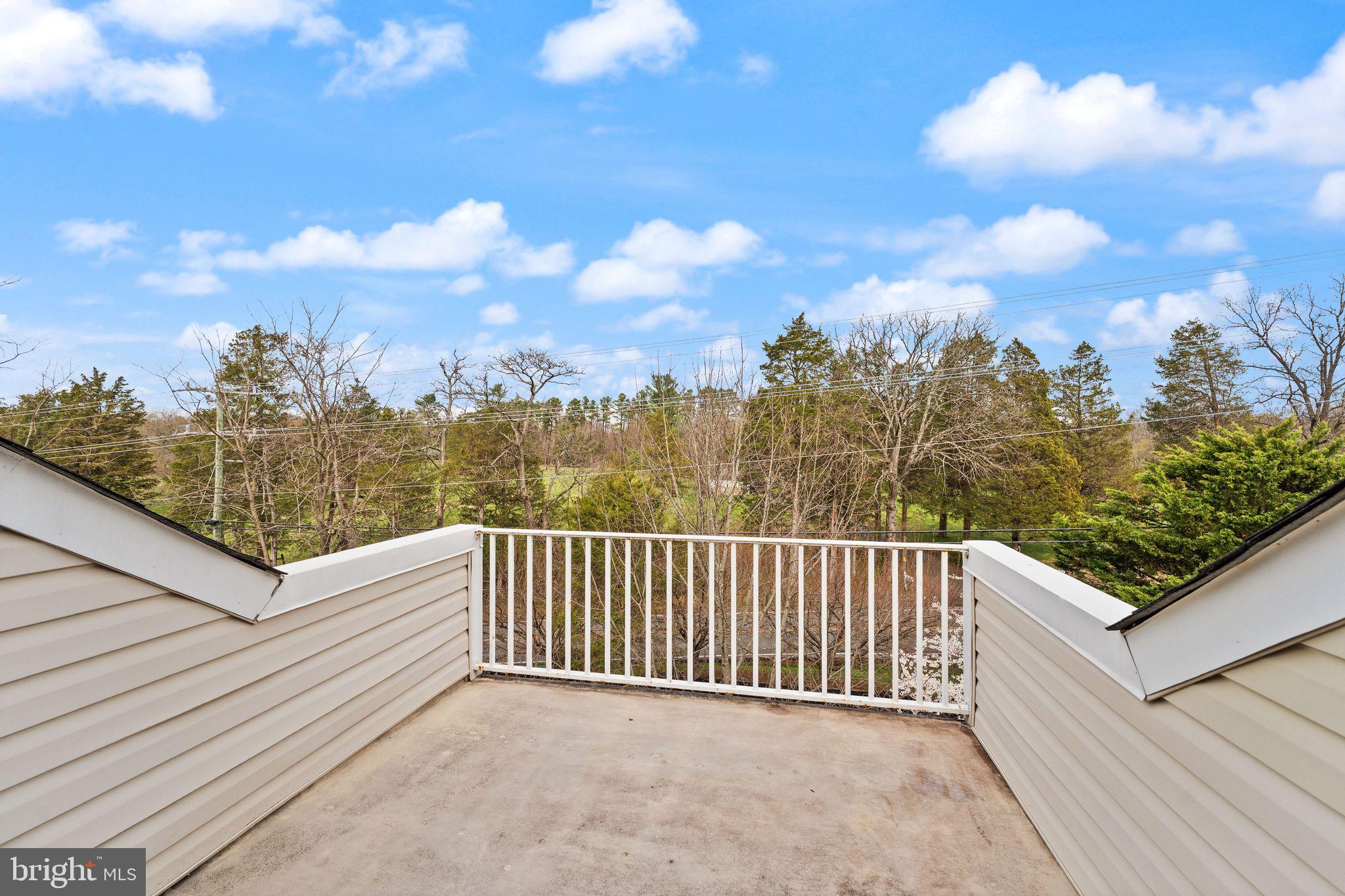 18168 Mill House Square Leesburg, VA 20176 - Photo 40 of 60 a view of balcony with furniture