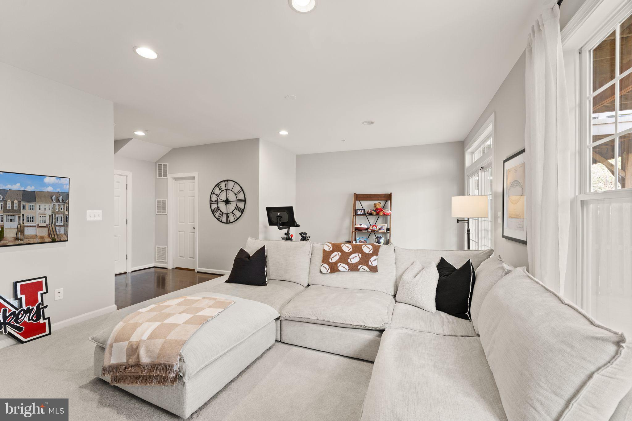 18168 Mill House Square Leesburg, VA 20176 - Photo 44 of 60 a bedroom with a large bed and a window