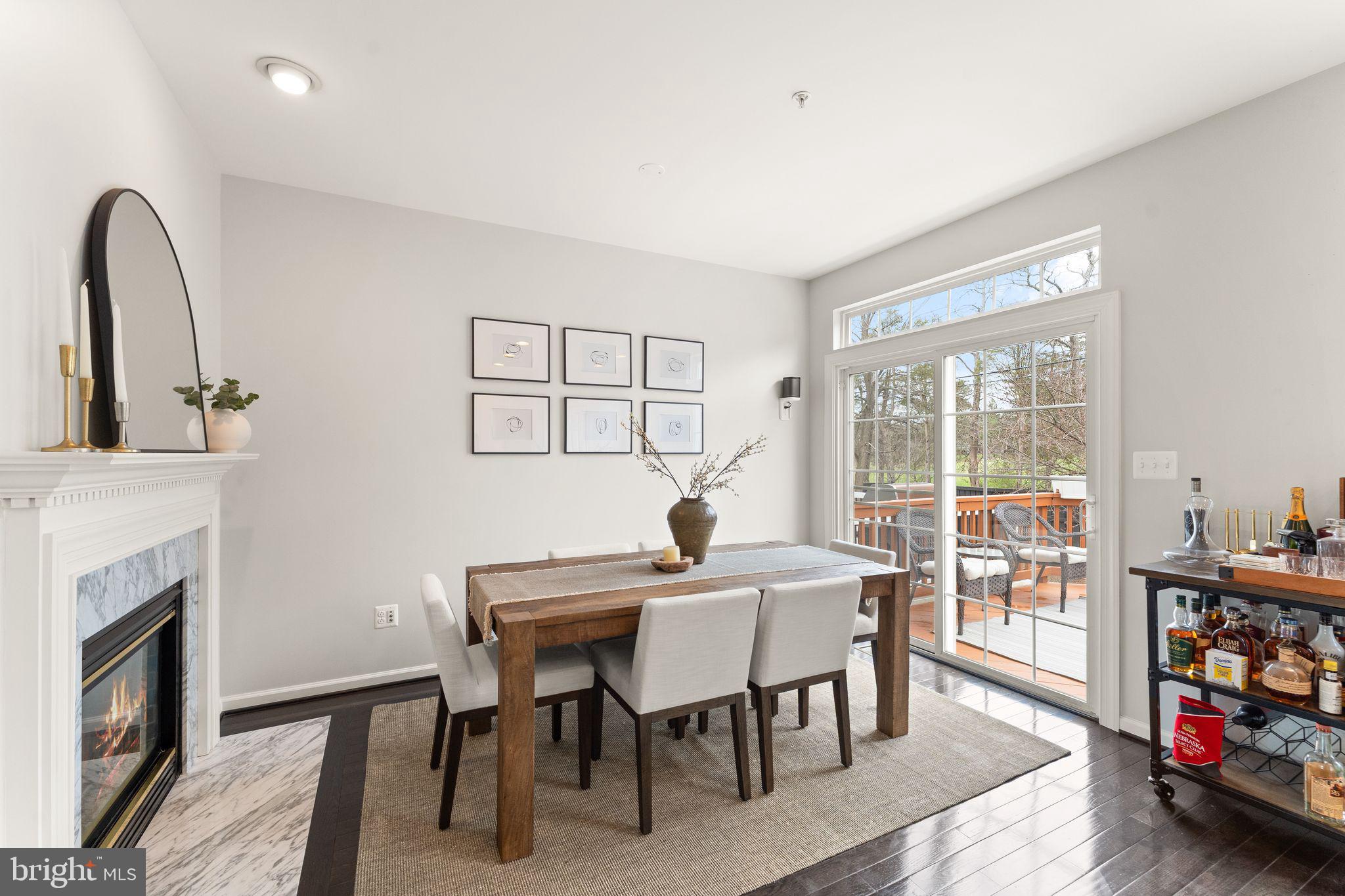 18168 Mill House Square Leesburg, VA 20176 - Photo 9 of 60 a view of a dining room with furniture window and wooden floor