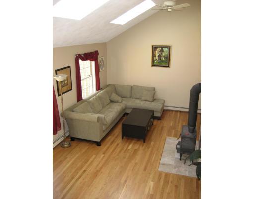 14 Turnpike Road Ipswich, MA 01938 - Photo 3 of 12 a living room with furniture and a window