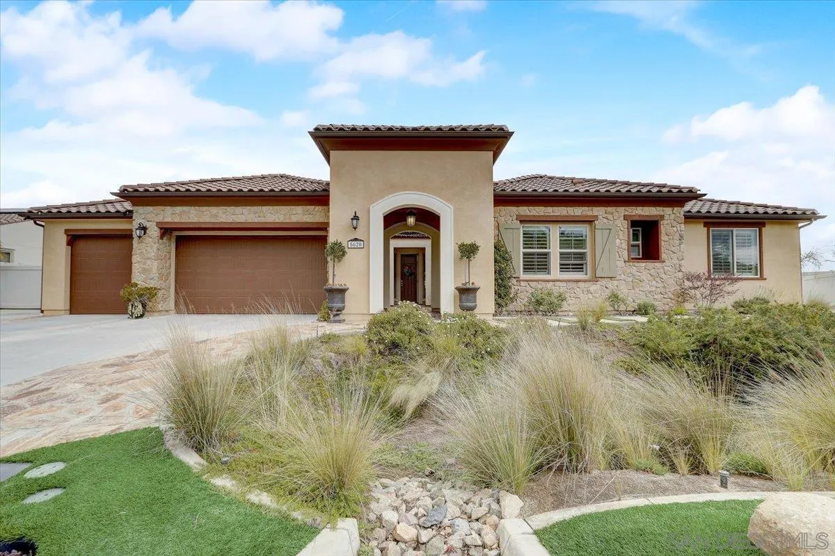 5620 Rancho Del Caballo Bonsall, CA 92003 - Photo 1 of 49 a front view of a house with a yard