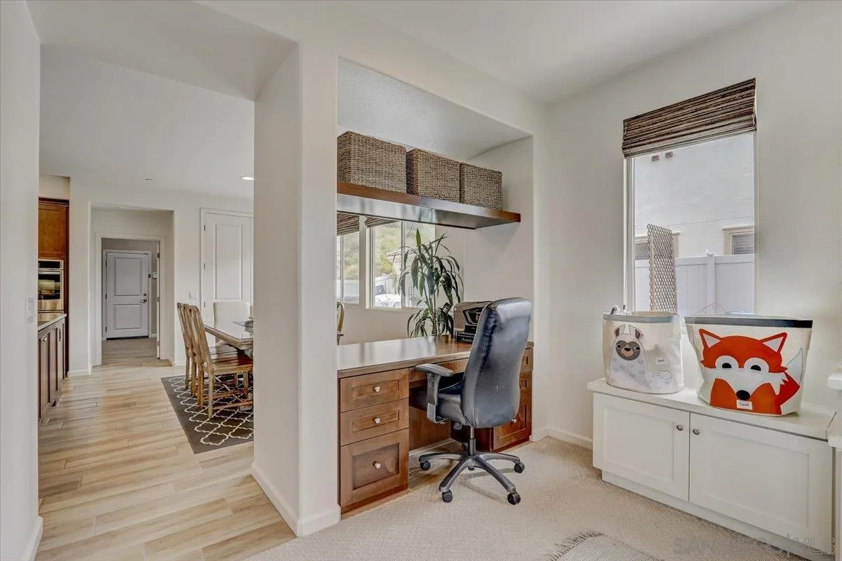 5620 Rancho Del Caballo Bonsall, CA 92003 - Photo 20 of 49 a view of a workspace with furniture and a window