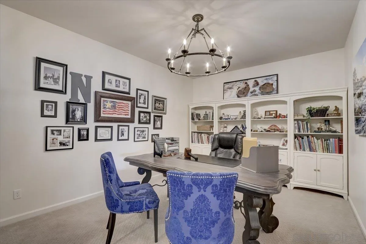 5620 Rancho Del Caballo Bonsall, CA 92003 - Photo 23 of 49 a work room with furniture and wooden floor