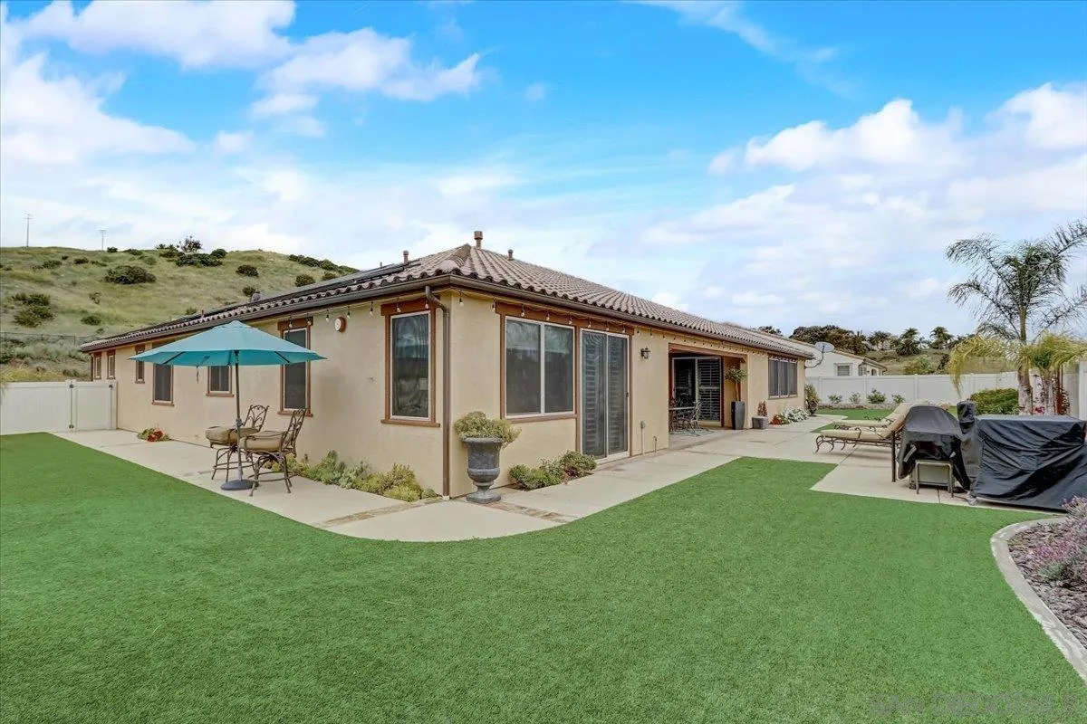 5620 Rancho Del Caballo Bonsall, CA 92003 - Photo 39 of 49 a front view of a house with garden