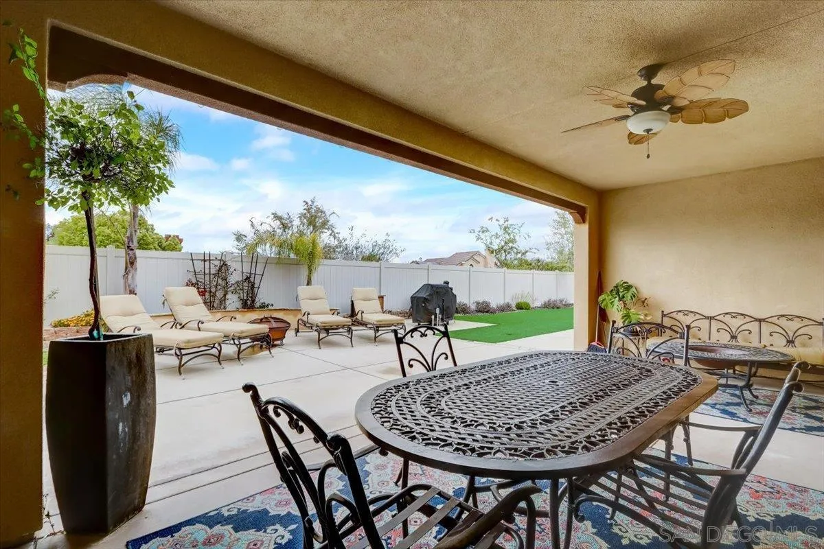 5620 Rancho Del Caballo Bonsall, CA 92003 - Photo 40 of 49 a view of a patio with a table and chairs