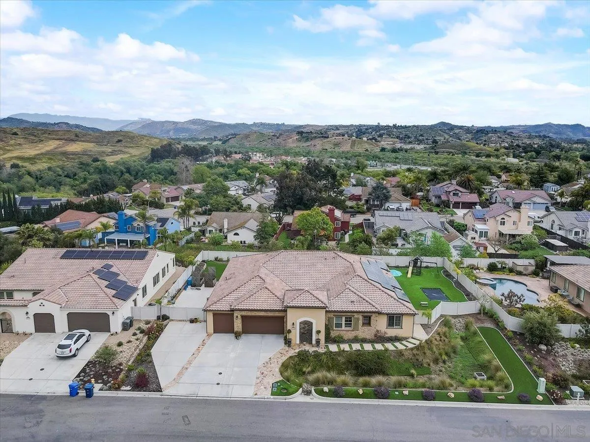 5620 Rancho Del Caballo Bonsall, CA 92003 - Photo 46 of 49 an aerial view of residential houses and street