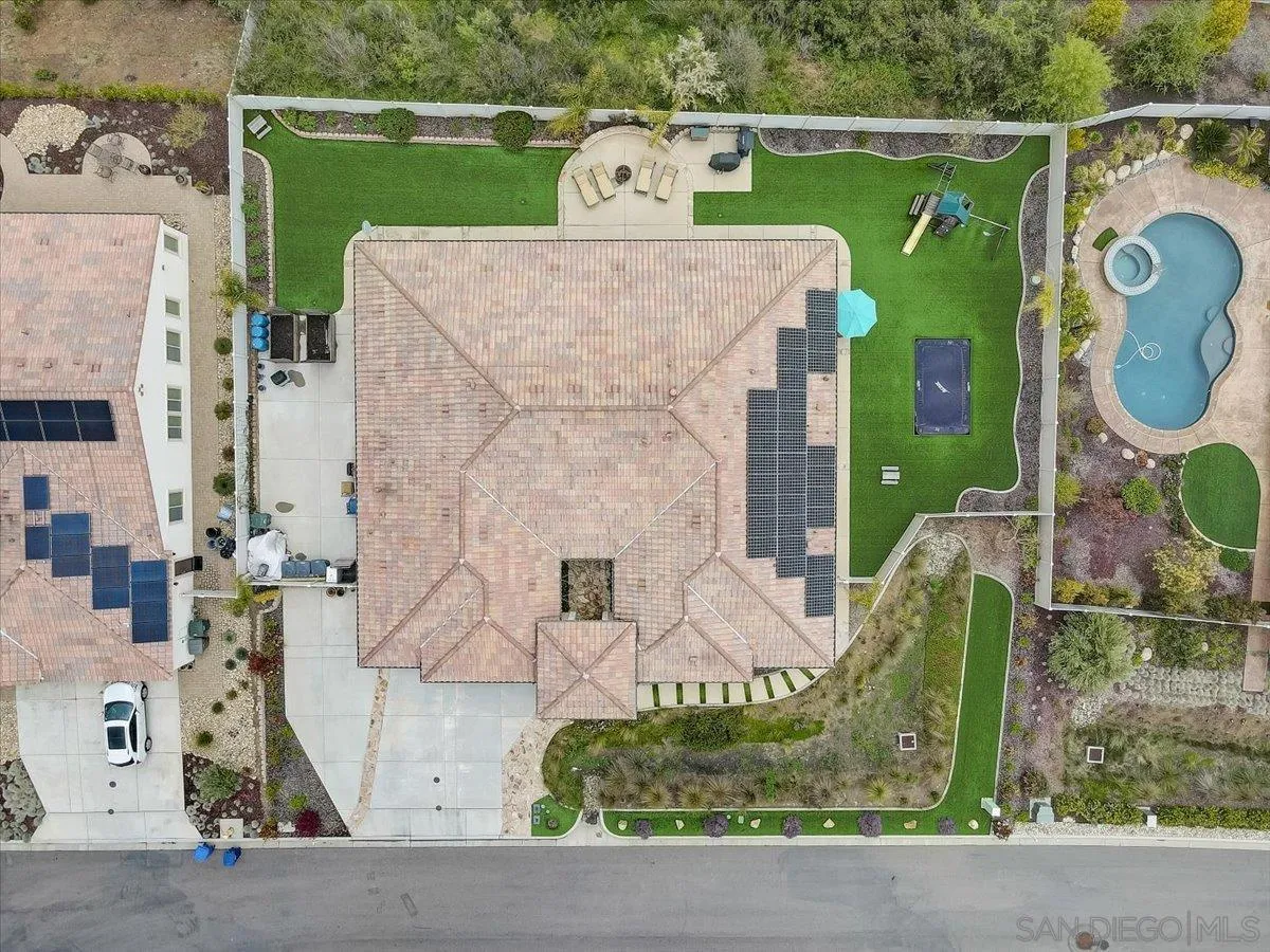 5620 Rancho Del Caballo Bonsall, CA 92003 - Photo 48 of 49 an aerial view of a house with a garden