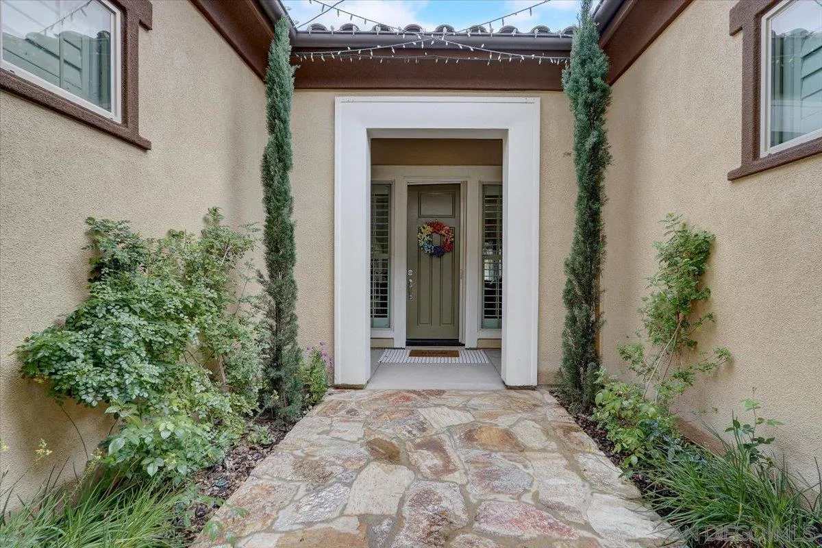 5620 Rancho Del Caballo Bonsall, CA 92003 - Photo 8 of 49 a view of a house with potted plants