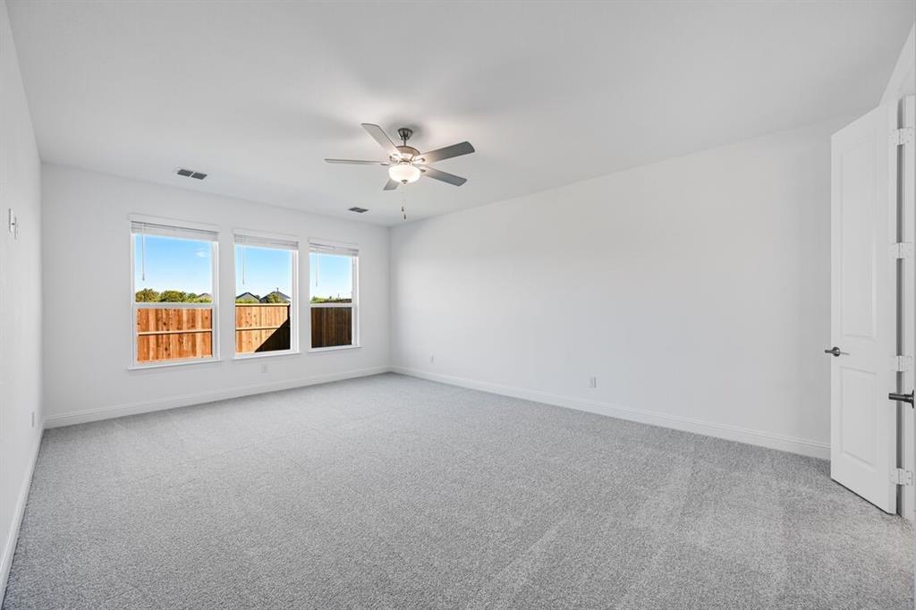 331 Trillium Street Oak Point, TX 75068 - Photo 17 of 36 wooden floor in an empty room with a window