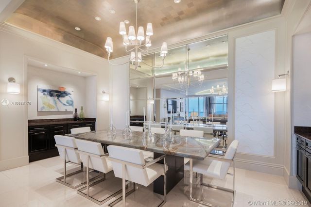 a view of a dining room and livingroom