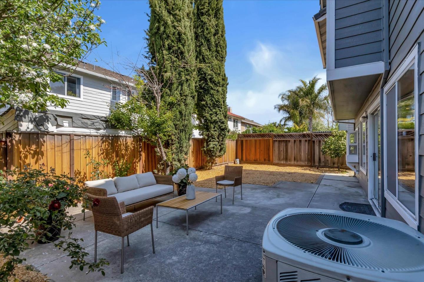 1483 Chavez Way San Jose, CA 95131 - Photo 16 of 40 a backyard of a house with outdoor seating