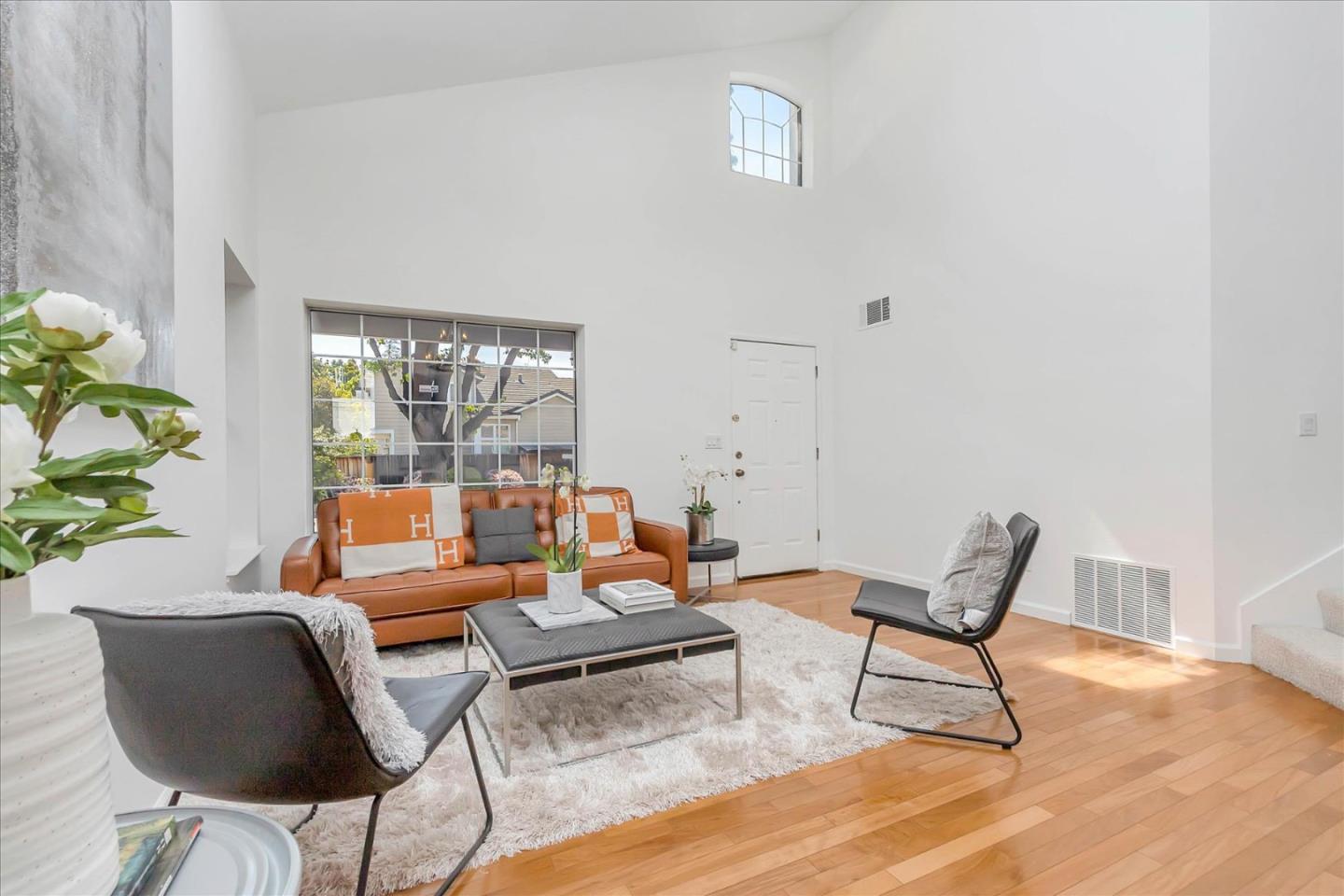 1483 Chavez Way San Jose, CA 95131 - Photo 18 of 40 a living room with furniture and a potted plant