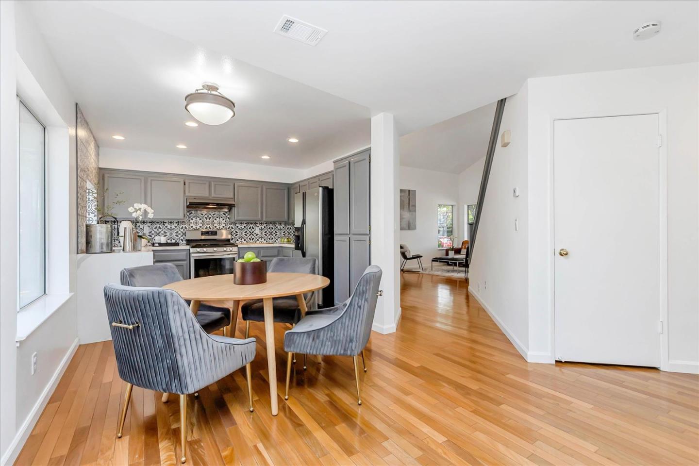 1483 Chavez Way San Jose, CA 95131 - Photo 20 of 40 a view of a dining room with furniture and wooden floor