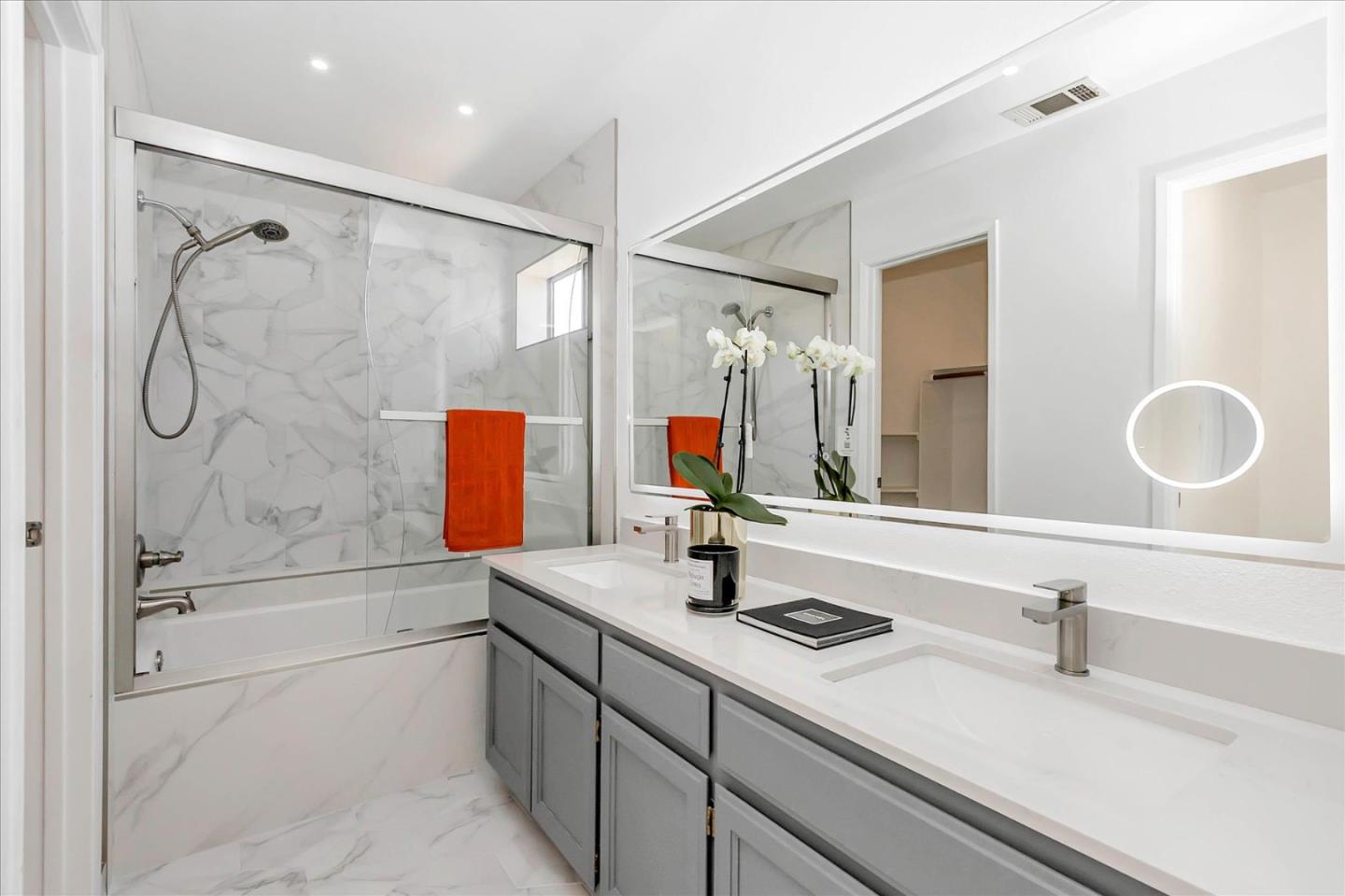 1483 Chavez Way San Jose, CA 95131 - Photo 21 of 40 a bathroom with a bathtub sink vanity and mirror