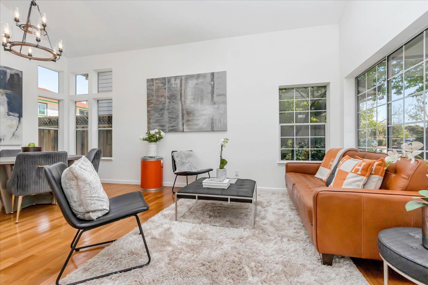 1483 Chavez Way San Jose, CA 95131 - Photo 23 of 40 a living room with furniture and a floor to ceiling window
