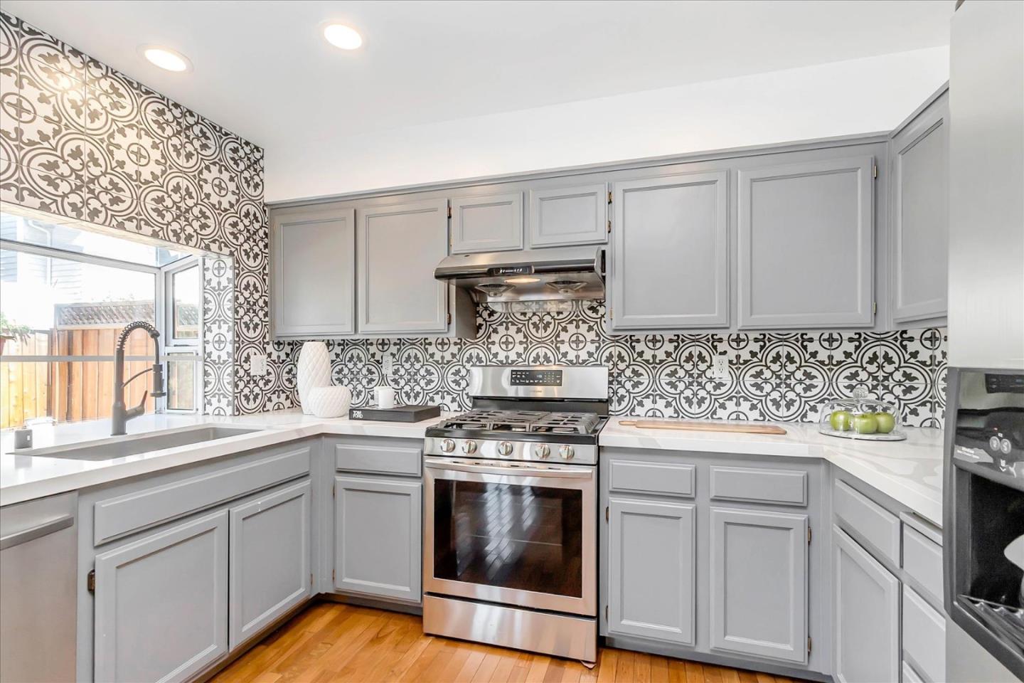 1483 Chavez Way San Jose, CA 95131 - Photo 32 of 40 a kitchen with cabinets appliances and a window