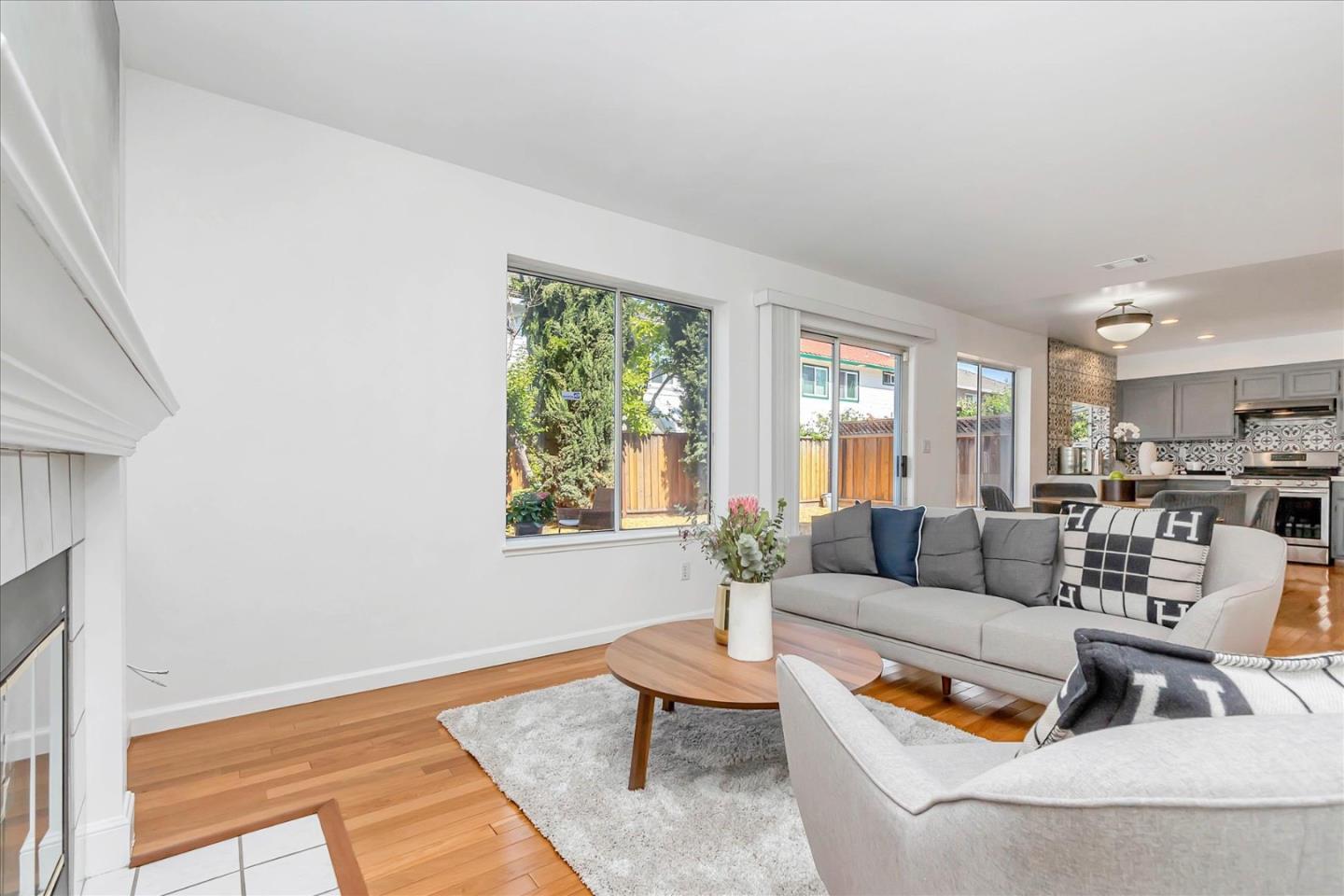 1483 Chavez Way San Jose, CA 95131 - Photo 39 of 40 a living room with furniture and a large window