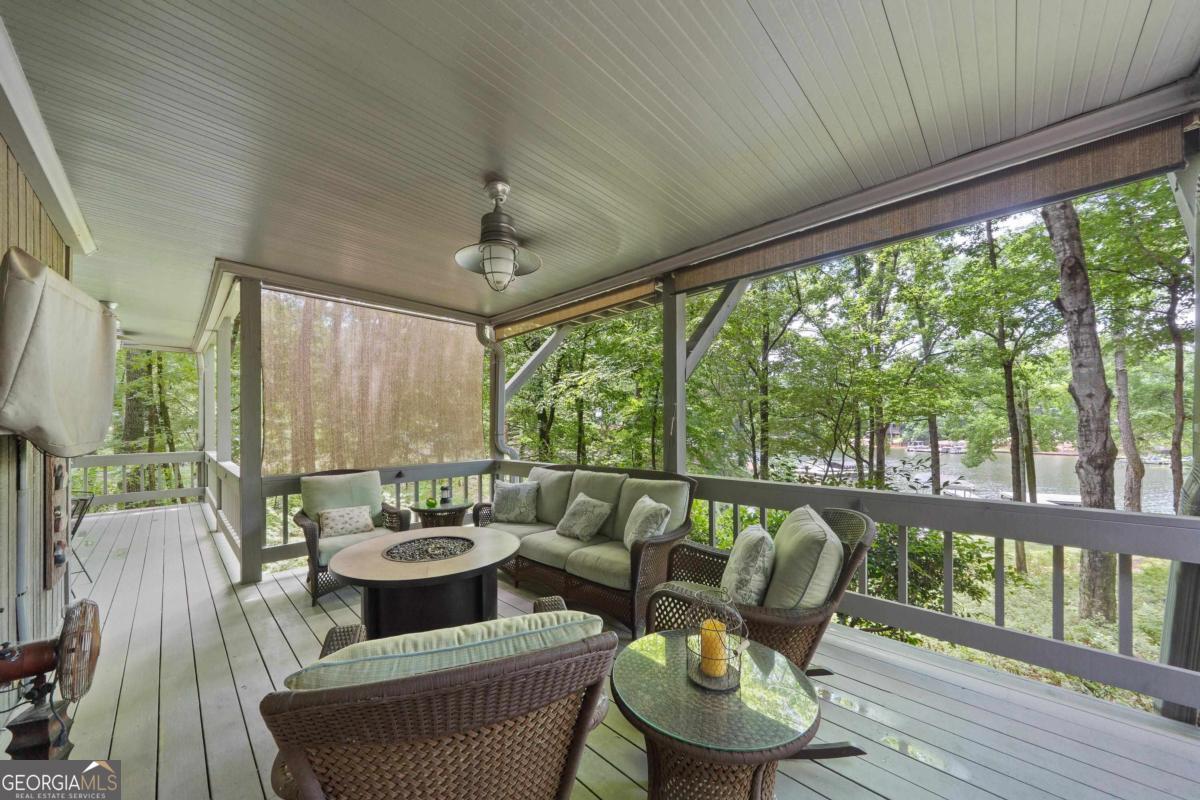 1031 Old Still Road Greensboro, GA 30642 - Photo 64 of 73 a view of a living room with furniture window and outside view