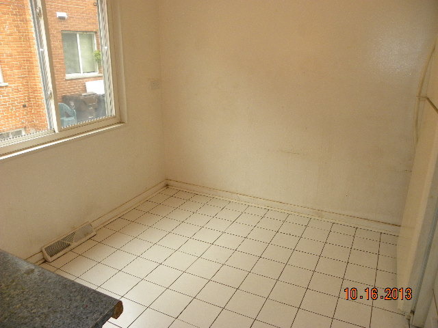 10027 Frontage Road, Unit F Skokie, IL 60077 - Photo 6 of 13 an empty room with windows