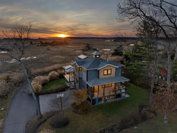 a view of a houses with a big yard
