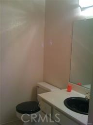 795 Daffodil Drive Riverside, CA 92507 - Photo 3 of 9 a bathroom with a sink and a toilet