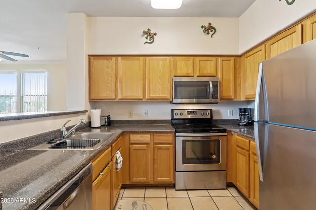 a view of a balcony with chairs