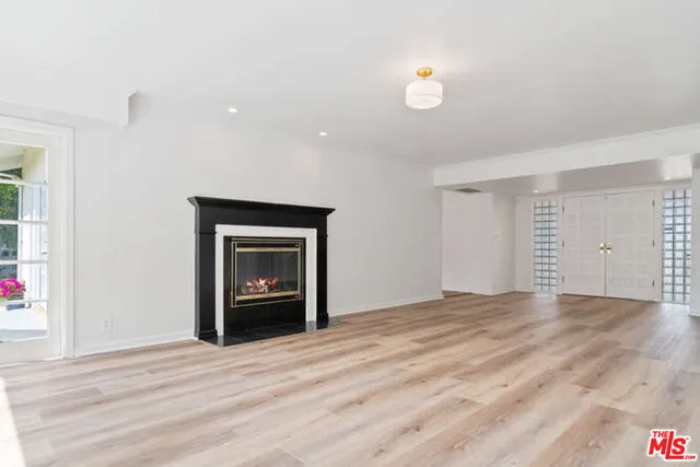 a kitchen with sink cabinets and window