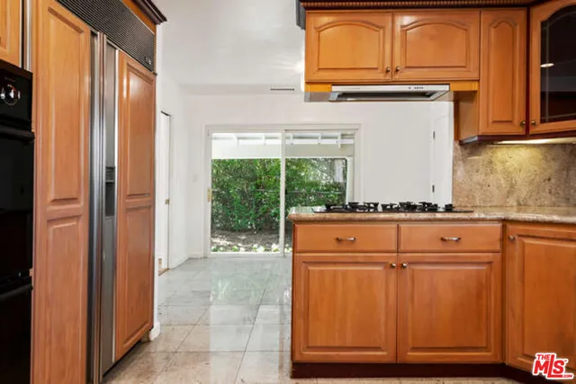 a view of closet area with empty racks