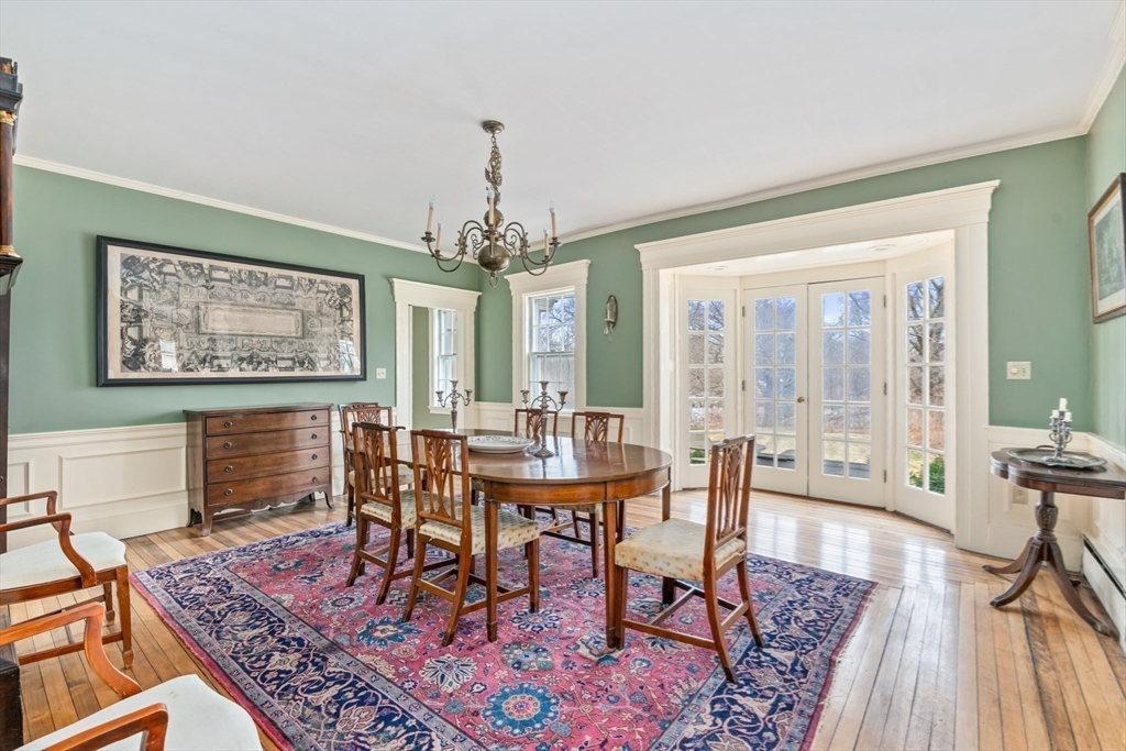 8 Washington Street Sherborn, MA 01770 - Photo 8 of 42 a view of a dining room with furniture window and wooden floor
