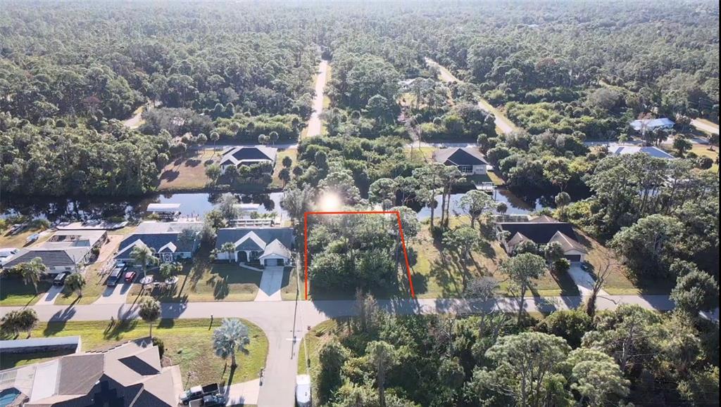 468 Cory Street Port Charlotte, FL 33953 - Photo 2 of 11 an aerial view of residential houses with outdoor space