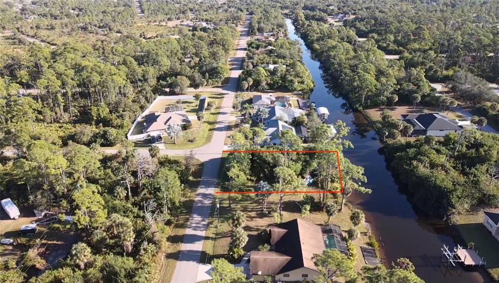 468 Cory Street Port Charlotte, FL 33953 - Photo 4 of 11 an aerial view of residential houses with outdoor space