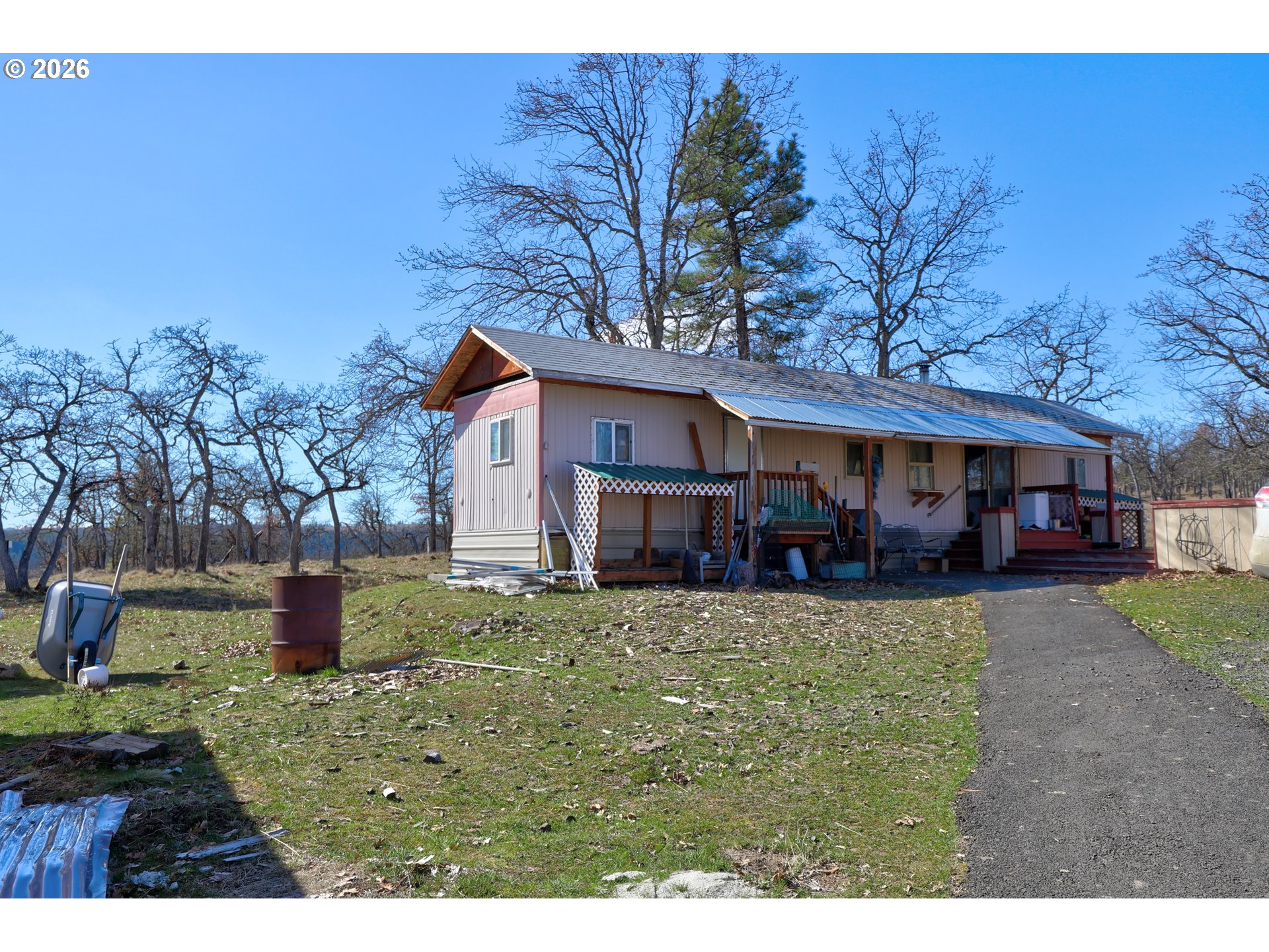 80165 Ridgetop Road Dufur, OR 97021 - Photo 21 of 43 a view of a house with a yard
