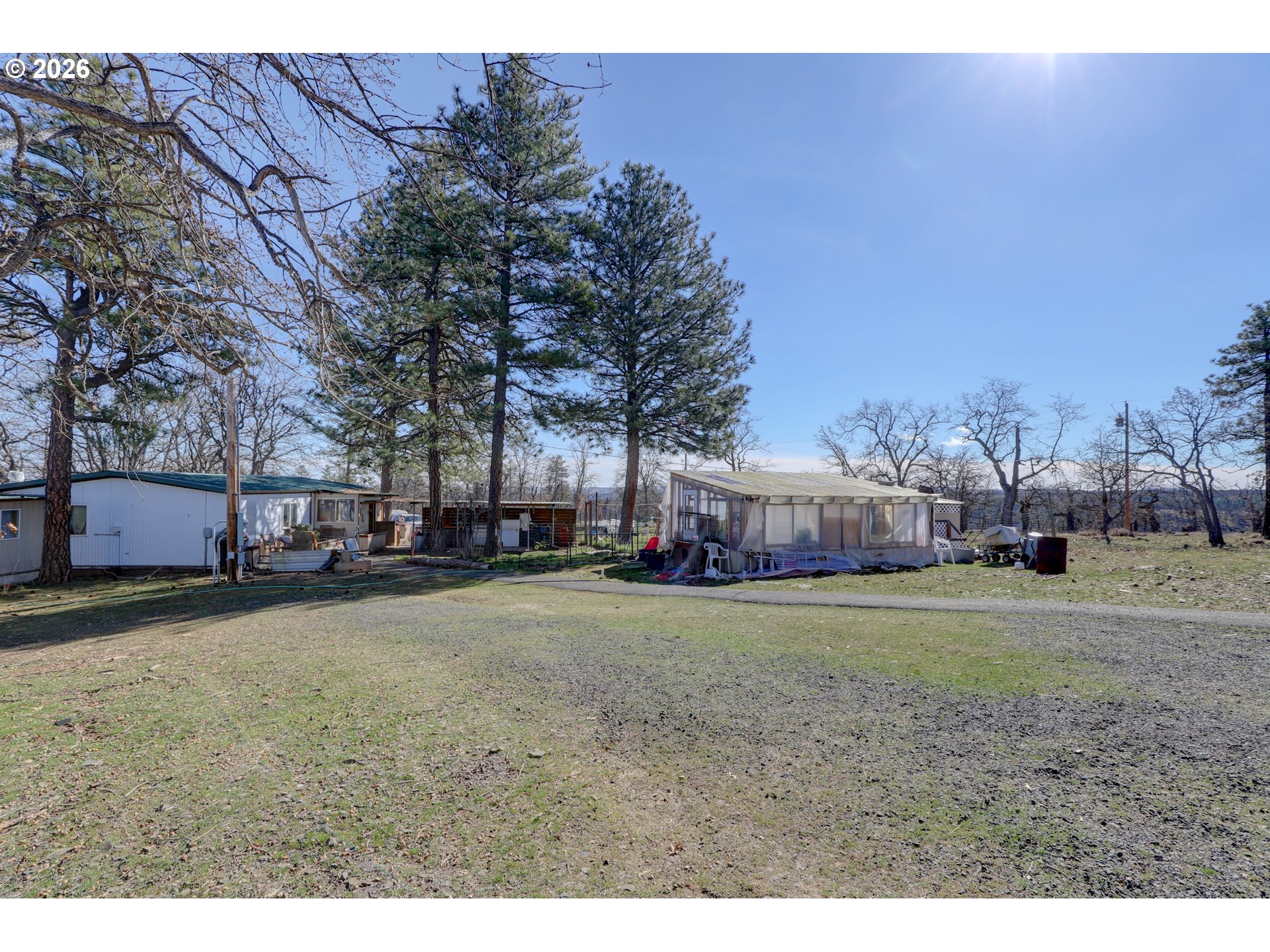 80165 Ridgetop Road Dufur, OR 97021 - Photo 30 of 43 a view of a big yard in front of the house