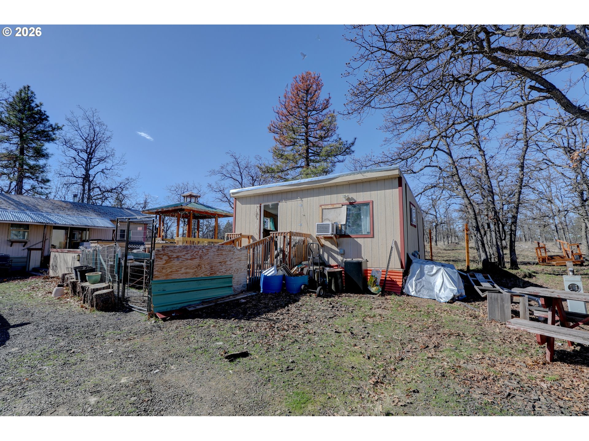 80165 Ridgetop Road Dufur, OR 97021 - Photo 31 of 43 a front view of a house with a yard