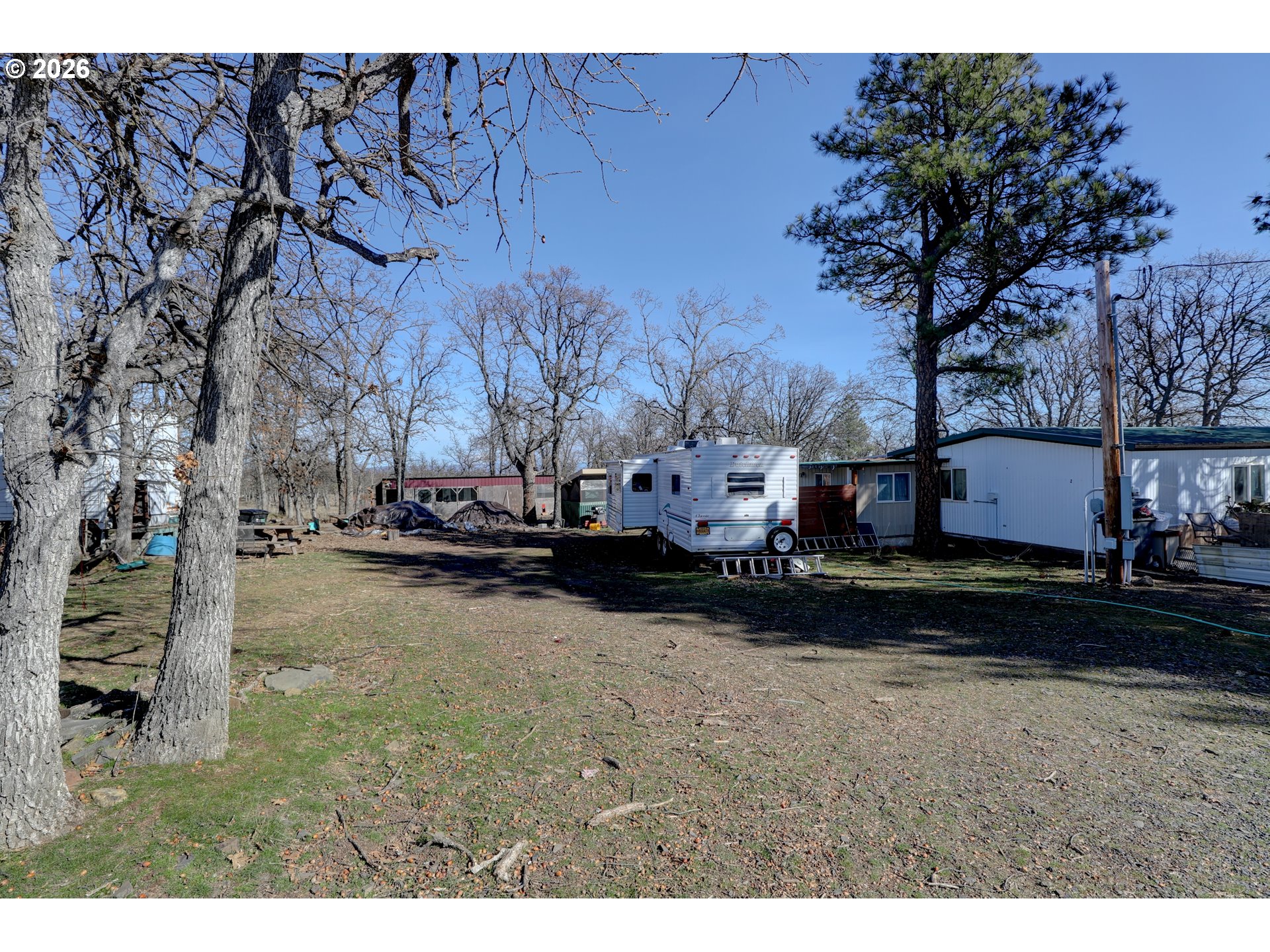 80165 Ridgetop Road Dufur, OR 97021 - Photo 32 of 43 a view of street with large trees
