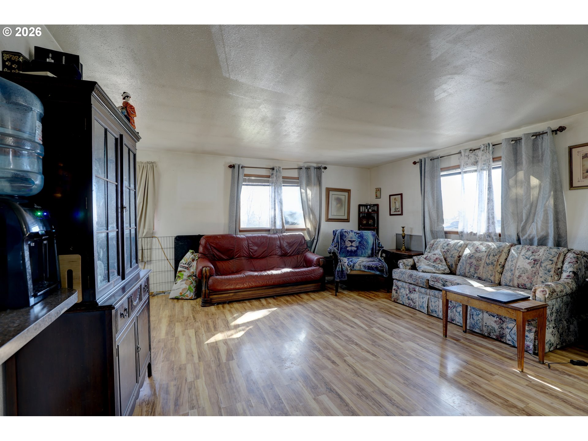 80165 Ridgetop Road Dufur, OR 97021 - Photo 7 of 43 a living room with furniture and a wooden floor