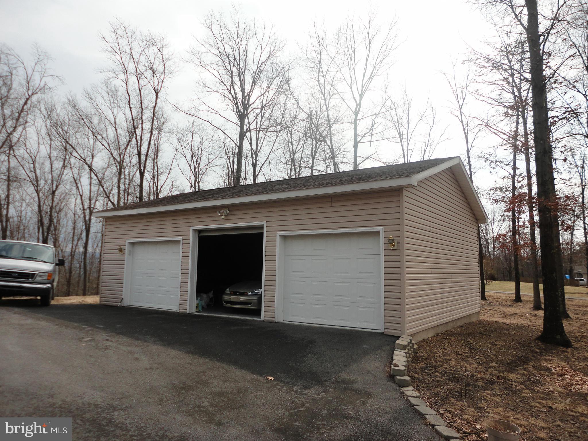 1339 Libby's Ridge Road Berkeley Springs, WV 25411 - Photo 2 of 25 3 car garage with own electrical panel