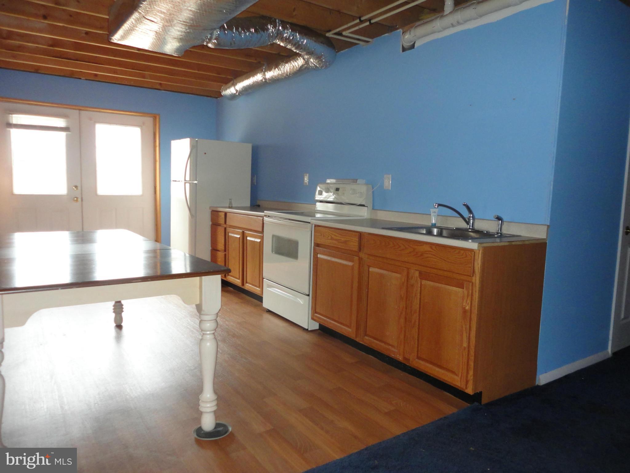 1339 Libby's Ridge Road Berkeley Springs, WV 25411 - Photo 25 of 25 2nd kitchen in the basement with appliances