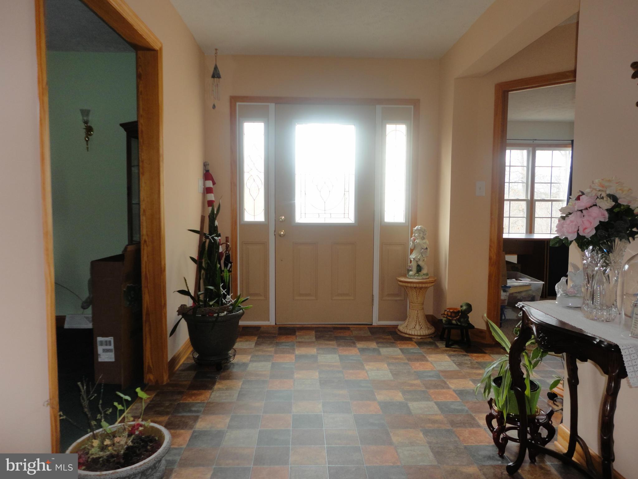 1339 Libby's Ridge Road Berkeley Springs, WV 25411 - Photo 7 of 25 front door and foyer