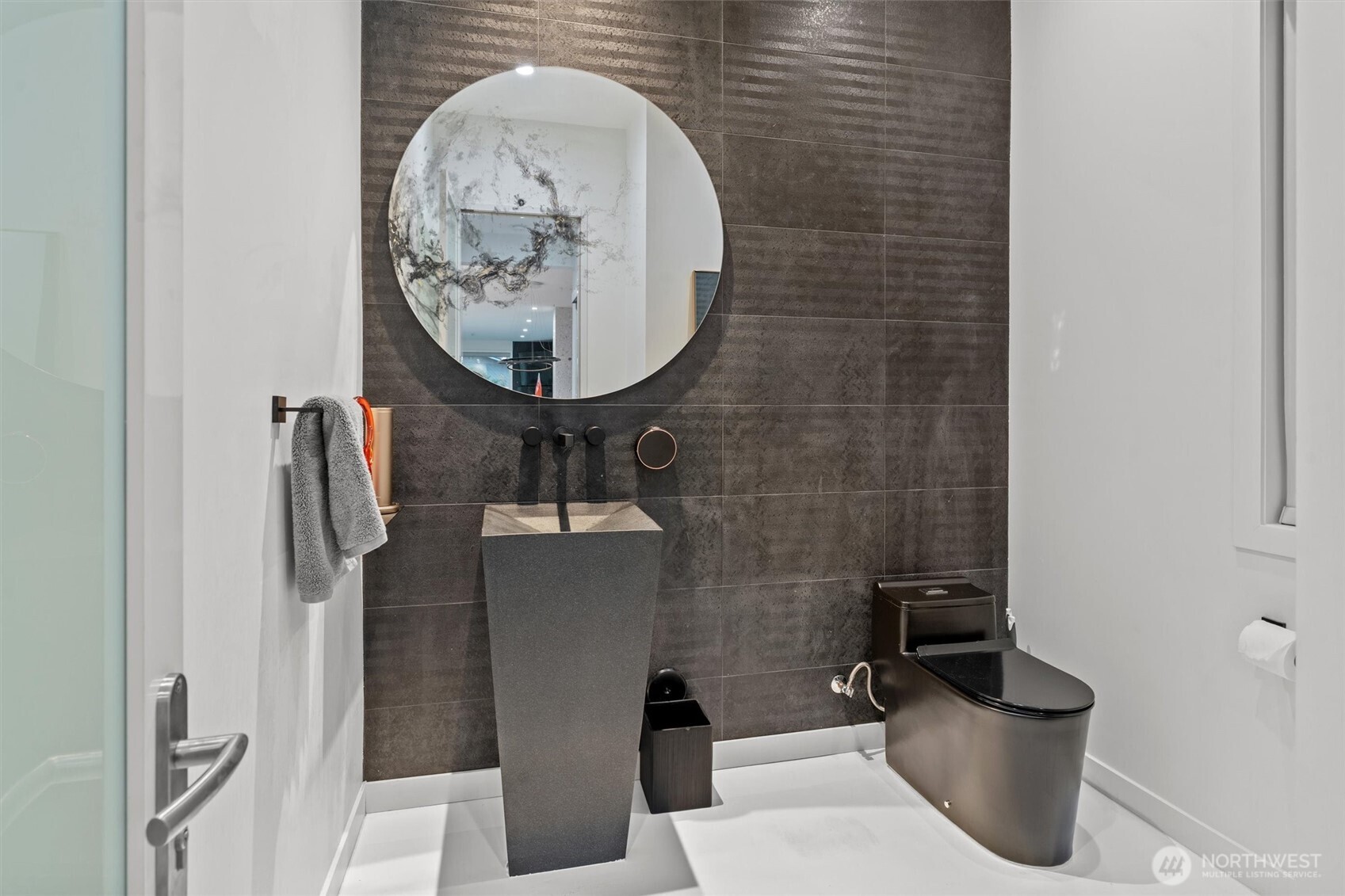 903 North 33rd Place Renton, WA 98056 - Photo 11 of 28 a bathroom with a toilet and a sink