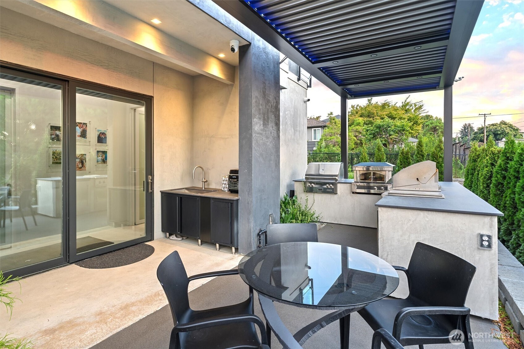 903 North 33rd Place Renton, WA 98056 - Photo 13 of 28 a outdoor space with patio the couches and a dining table with garden view