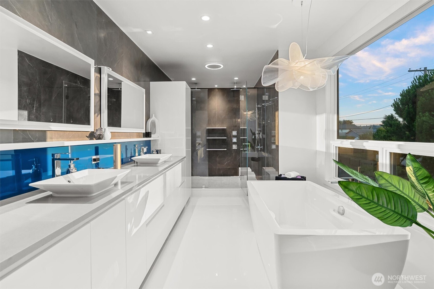 903 North 33rd Place Renton, WA 98056 - Photo 18 of 28 a large white kitchen with a large window