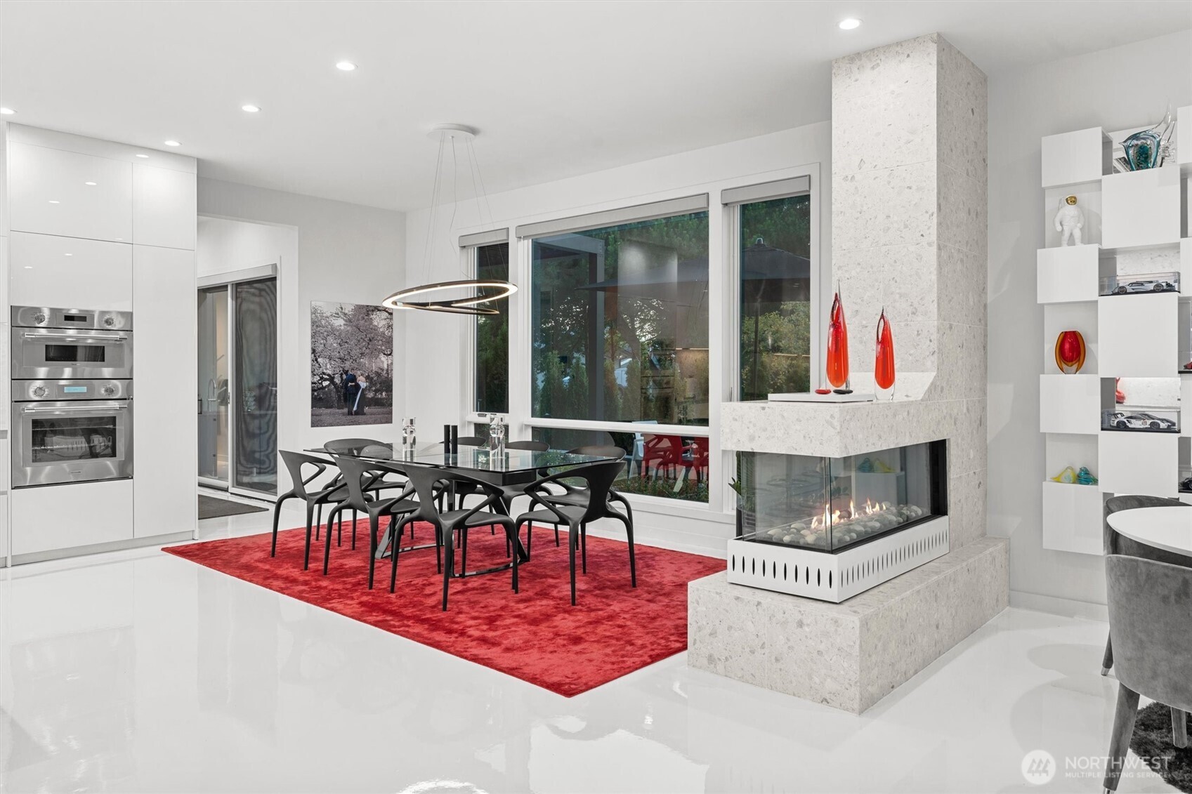 903 North 33rd Place Renton, WA 98056 - Photo 9 of 28 a living room with furniture and a floor to ceiling window