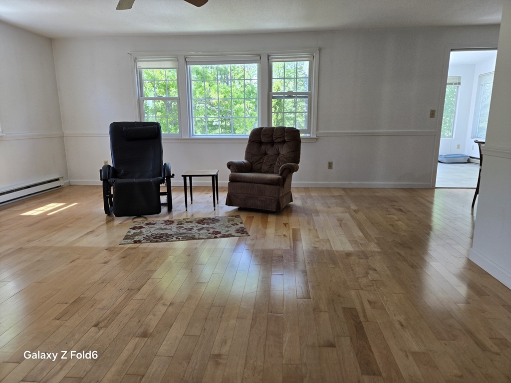 222 Buck Island Road, Unit 45 Yarmouth, MA 02673 - Photo 5 of 23 a living room with furniture and a window